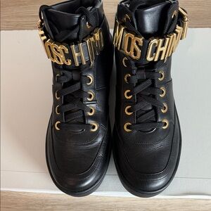 Moschino Black Leather Sneakers with Gold Lettering